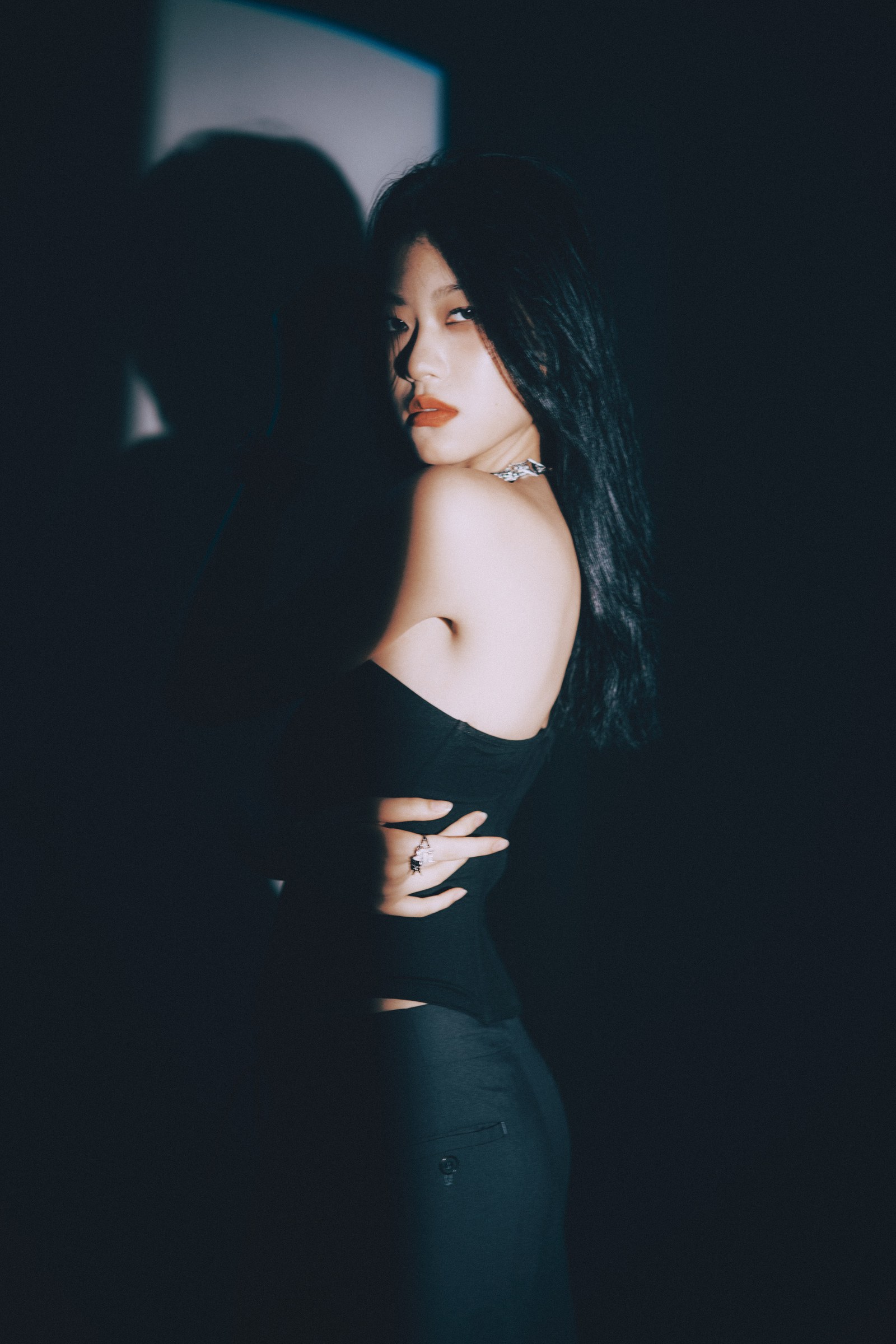 Shadow-led fashion portrait of model Emma by Eddie Huynh
