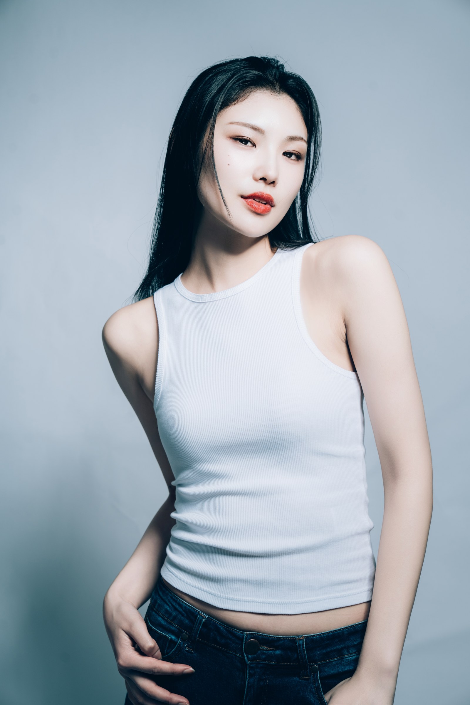 Minimal studio portrait of model Kana by Eddie Huynh