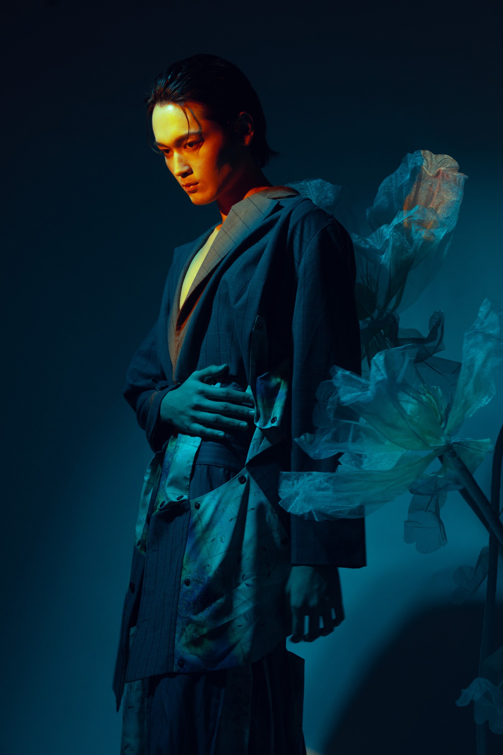 Dark teal fashion portrait of model Onie by Eddie Huynh